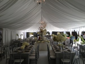 30x60 tent with chandeliers and draping